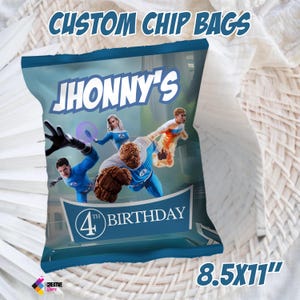 May include: Custom chip bag with a blue and white design featuring the text "JHONNY'S" and "4th BIRTHDAY". The bag has a superhero theme with illustrations of characters. The bag measures 21.59 x 27.94 cm.