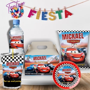 May include: A Cars-themed party favor set with a red, white, and black checkered pattern. The set includes a juice box, a water bottle, a snack bag, a party favor box, and a plate. The labels feature the character Lightning McQueen and the text "Mickael is turning 5th".