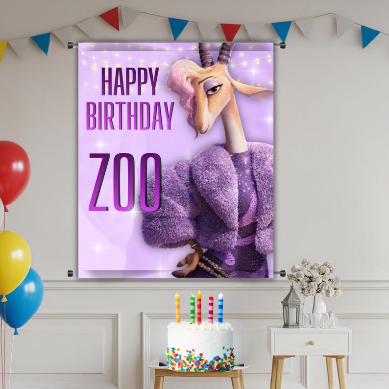 May include: A birthday banner featuring a cartoon gazelle in a purple fur coat, with the text "HAPPY BIRTHDAY ZOO" in purple. A birthday cake with colorful sprinkles and candles is in front of the banner. Balloons and decorative flags are also visible.