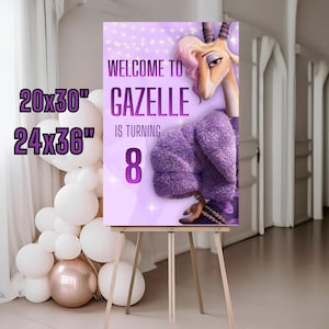 May include: A purple welcome sign on an easel, featuring the text "WELCOME TO GAZELLE IS TURNING 8." The sign includes an illustration of a gazelle in a purple outfit. The sign is available in 20x30" and 24x36" sizes.