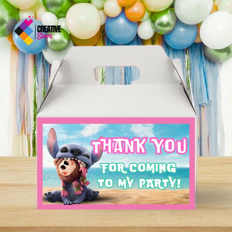May include: White party favor box with a pink border featuring a cartoon character and the text "THANK YOU FOR COMING TO MY PARTY!". The box has a handle and is decorated with balloons.