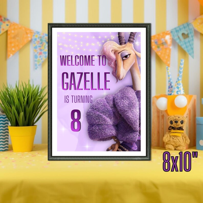 May include: Framed print featuring a cartoon gazelle with the text "Welcome to Gazelle is turning 8." The print is 8x10 inches. The gazelle is wearing a purple coat. The background is light purple with string lights.