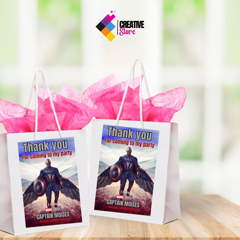 May include: Two white gift bags with pink tissue paper inside. The bags have a printed label with a superhero character, Captain Moises, and the text "Thank you for coming to my party".