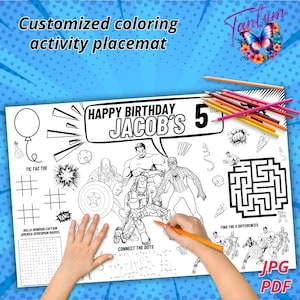May include: A black and white colouring placemat featuring a superhero theme. The placemat includes a noughts and crosses game, a connect-the-dots activity, a spot-the-difference game, and a maze. The placemat is personalised with the name "Jacob's" and the number "5".