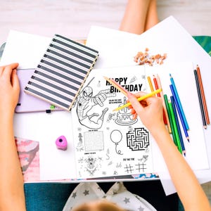 May include: A black and white printable coloring page featuring Spiderman. The page includes a word search, connect the dots, maze, and tic-tac-toe game. The text on the page reads "Happy Birthday".