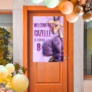 May include: A party banner on a wooden door with the text "WELCOME TO GAZELLE IS TURNING 8". The banner features a cartoon gazelle wearing a purple coat. Balloons in shades of yellow, orange, and gold decorate the scene.
