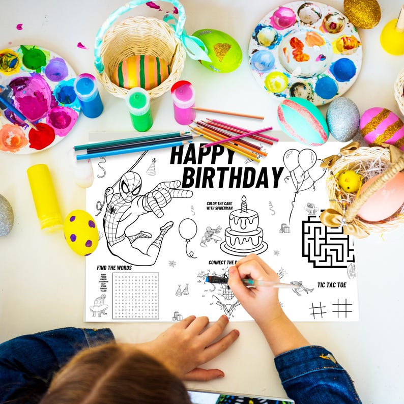 May include: A black and white coloring page featuring Spiderman, a birthday cake, balloons, a maze, a word search, and a tic-tac-toe game. The page says "Happy Birthday".