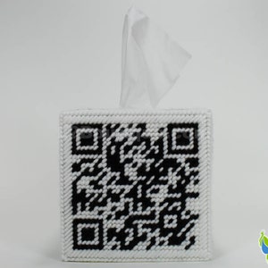 May include: White tissue box cover with a black and white QR code design.