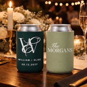 May include: Two personalised can coolers, one dark green and one light green, with silver tops. The dark green cooler has a white monogram and the names "William + Elise" with a date. The light green cooler says "The Morgans".