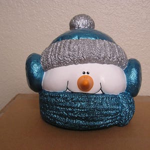 Snowman Head Teal Blue & Silver Ear Muffs Cookie Jar