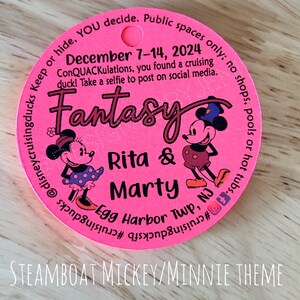 May include: A circular bright pink tag featuring cartoon mice characters, the text "Fantasy", "Rita & Marty", "Egg Harbor Twp, NJ", and "December 7-14, 2024". The tag includes social media icons and instructions for a cruising duck activity.