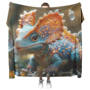 Baby Triceratops Blowing Bubbles Surrounded by Shimmering Textures and Vibrant Colors Fleece Sherpa Blanket