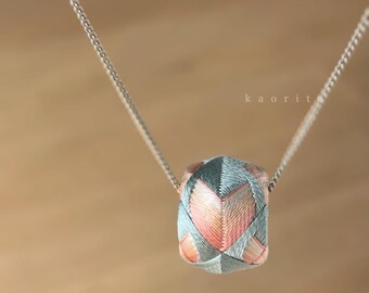 Sakura Necklace based on the traditional Japanese thimble "Kaga Yubinuki". Embroidered with silk thread. Cherry blossom flower.