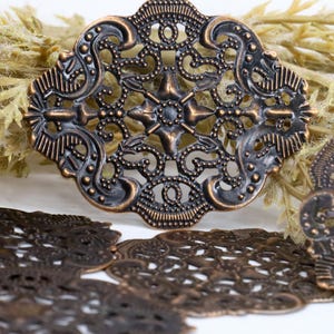 10 Antique copper Filigree jewelry findings stamped medallion Victorian style openwork lace 44mm x 34mm