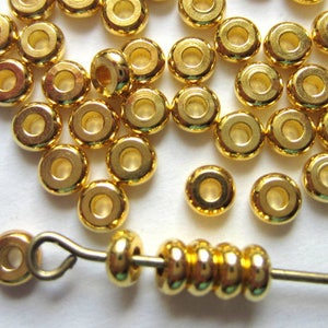 100 Spacer beads gold beads metal diy jewelry supply gold spacer beads accent beads 4mm x 2mm rondelle beads