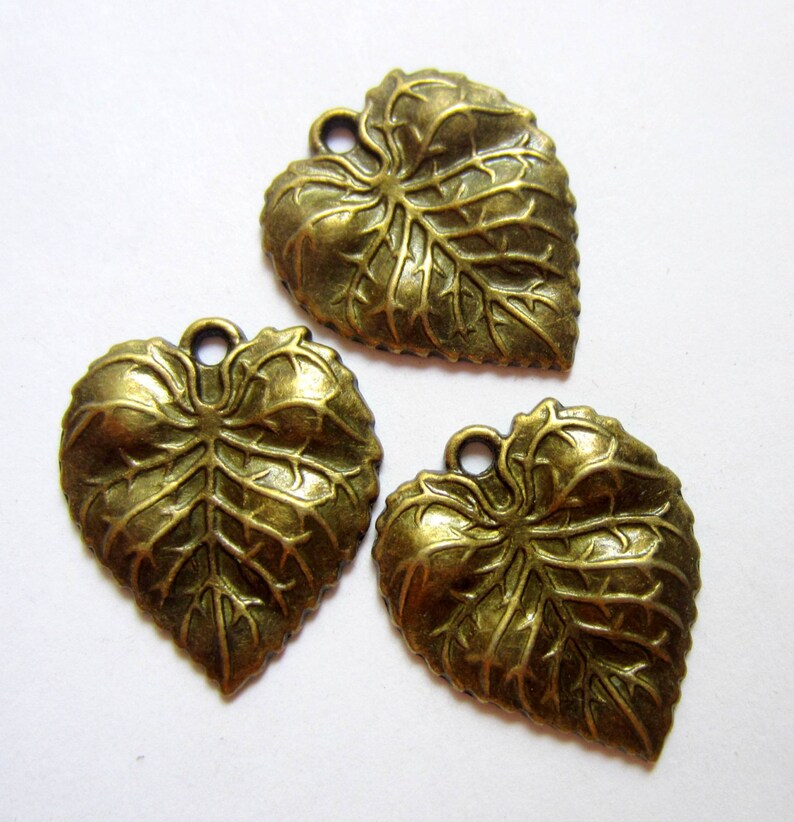 8 Antique bronze leaf charm jewelry pendants metal jewelry making supplies 26mm x 22mm image 1