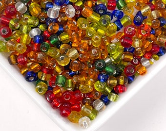50 g - Perles de rocaille en verre 6/0, trou rond bordé d'argent, rond, couleurs mélangées, 4 mm