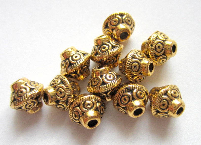 30 Antique gold beads tibetan gold spacer beads Hole to Hole Width 7mm x Cross width is 6mm jewelry supplies image 1