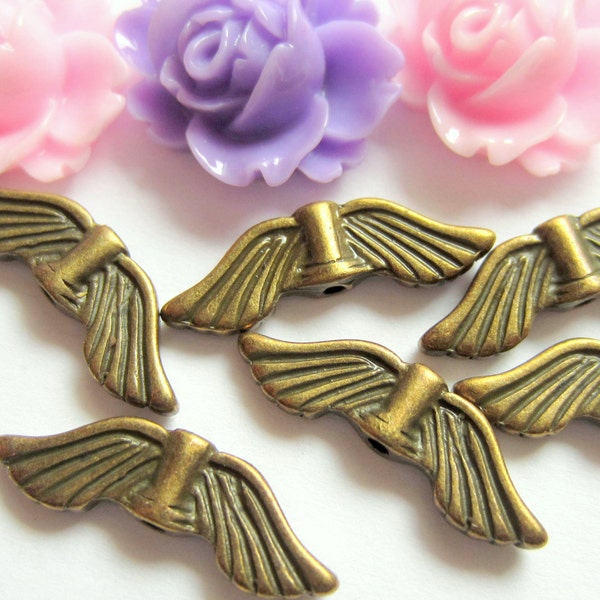 10 angel wing bead spacer charms antique bronze craft jewelry supply no lead no nickle 21mm x 6.5mm  821y