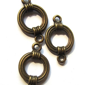 12 Bronze jewelry connectors circle links antique bronze metal