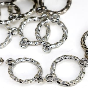 Silverfärgade smyckeskopplingar 22 mm x 16 mm runda silverlänkar Antal 8 bild 1