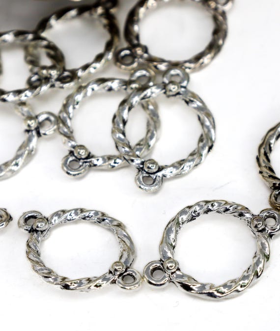 Silver twist  jewelry connectors  22mm x 16mm round silver links Qty 8