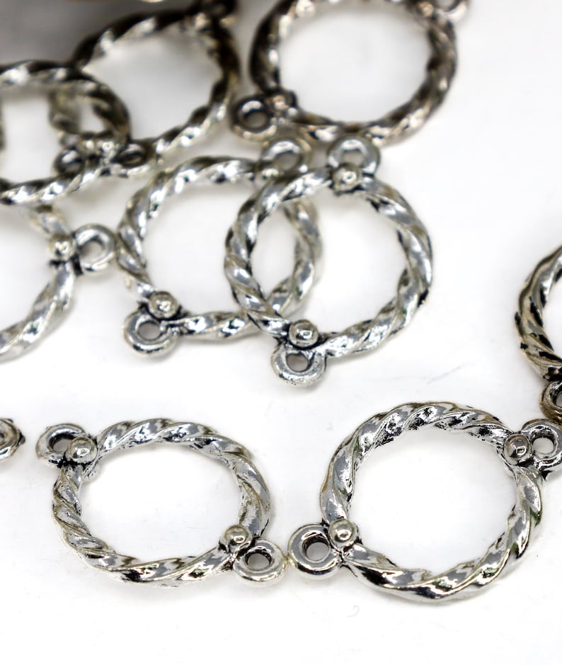 Silverfärgade smyckeskopplingar 22 mm x 16 mm runda silverlänkar Antal 8 bild 1