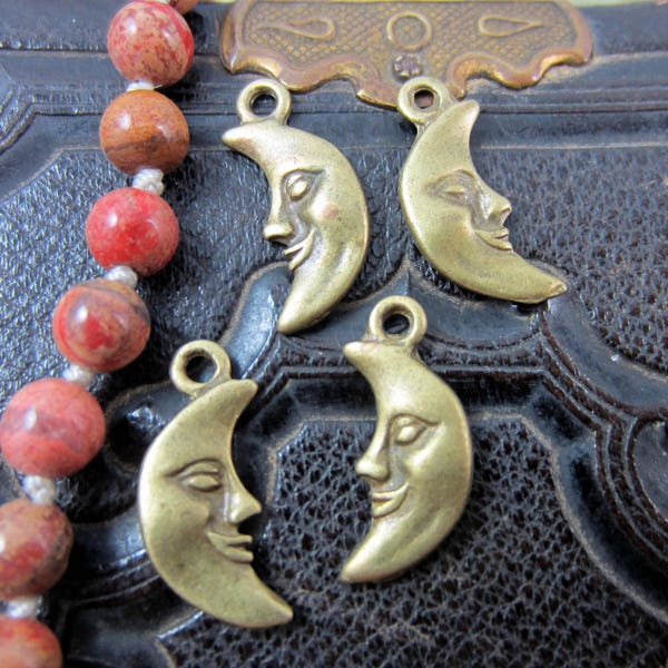 10 Bronze Moon charms metal man in the moon celestial charm jewelry no lead no nickel double sided charms 19mm x 10mm