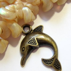 10 Bronze dolphin charms use for bracelets necklace pendants arts craft supplies