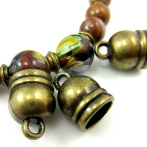 24 Antique bronze cord ends  14mm x 10mm glue in cord caps jewelry terminator