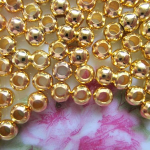 Gold spacer beads Electroplate Glass Seed Beads, Round Hole Rocailles, Golden Plated, 3.5~5.5x2.5~6.8mm, Hole: 1mm, 50g
