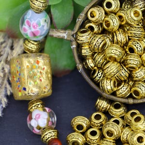Antique gold beads  metal  spacer jewelry supply 9mm x 7mm