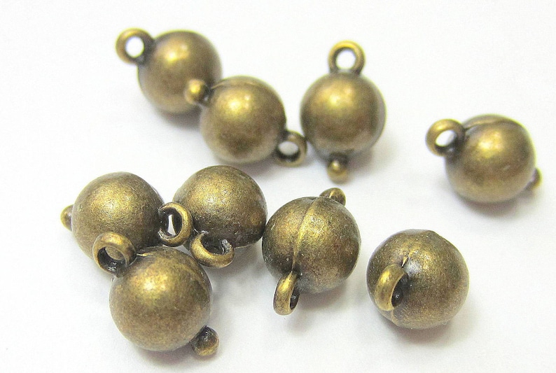 50 Antique Bronze Ball Dangles 5mm X 9mm Jewelry Loop Drop Etsy