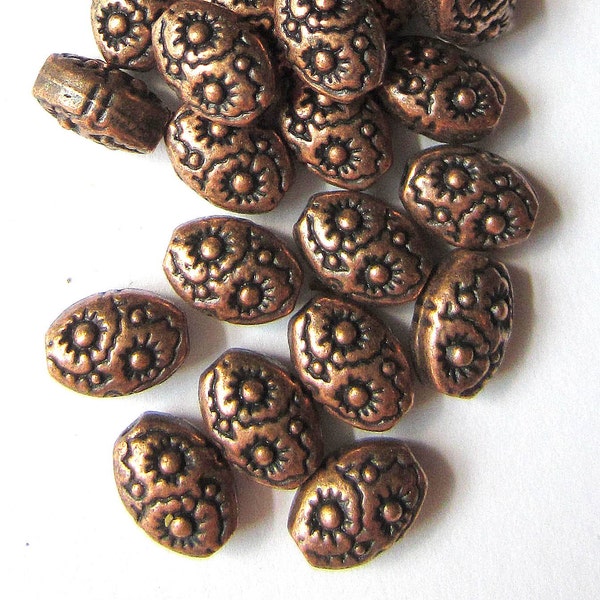 30 Antique Copper beads oval embossed Tibetan style 8mm x 6mm