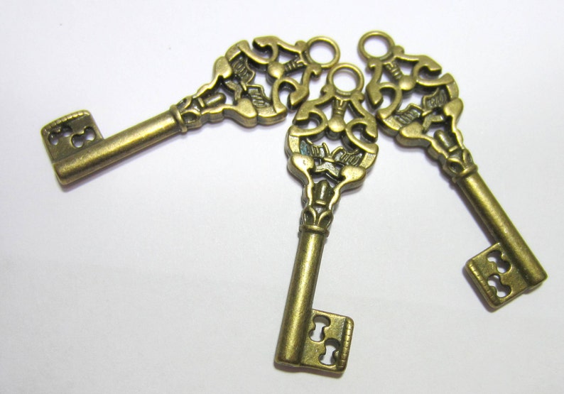 10 Antique Bronze Skeleton Key Pendant Charms Jewelry Supply Etsy
