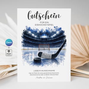 Puede incluir: Un vale de regalo blanco con una ilustración de acuarela de una pista de hockey, un disco y un palo. El texto "Gutschein für ein Eishockeyspiel" está en la parte superior. El texto inferior dice "LIEBE/R WUNSCHNAME" y "Mattes & Selina".