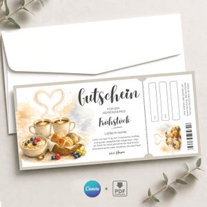 May include: A breakfast-themed gift voucher featuring a watercolour illustration of coffee cups, croissants, and fruit. The German text reads "Gutschein für ein gemeinsames Frühstück" and includes space for a personal message. A white envelope is in the background.