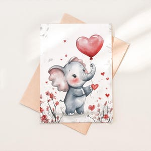 Tarjeta con globo y corazón de elefante