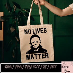 May include: A white tote bag with a black graphic of a horror movie character and the text "NO LIVES MATTER".