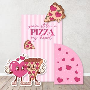 May include: A pink and white striped card with the text "you've stolen a PIZZA my heart". There are two pizza slice illustrations with hearts on them. One is a heart-shaped pizza slice with eyes and arms. The other is a regular pizza slice with eyes and arms. There is a pink background with white hearts.
