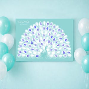 May include: A teal-colored canvas print featuring a peacock design. The peacock's feathers are composed of white and purple fingerprints. The print includes the text "Verity and Olufemi" and the date "28th April 2020".