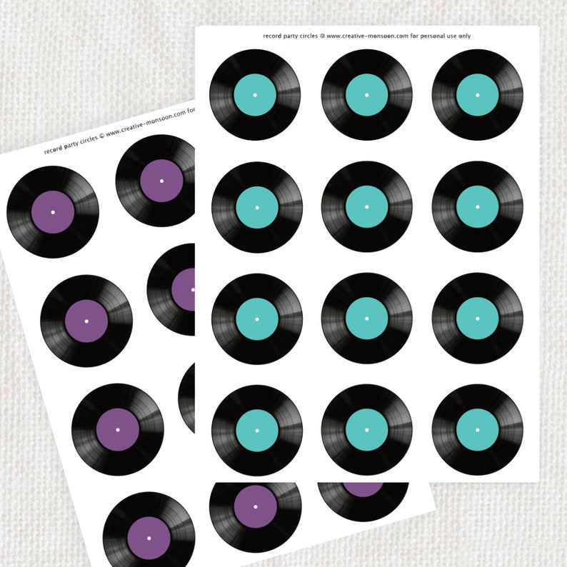 May include: Printable sheet of 18 black and white record party circles. The circles have a purple or turquoise center.