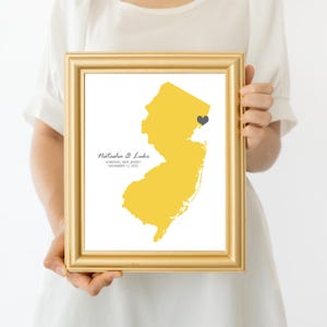 Person holding wedding gift personalised map design