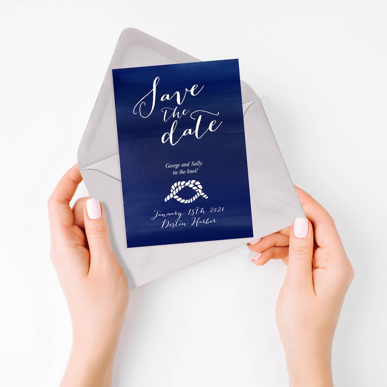 May include: A blue save the date card with white text that reads "Save the date" in cursive. The card also includes a white rope knot graphic and the text "George and Sally tie the knot! January 15th 2021 Destin Harbor"