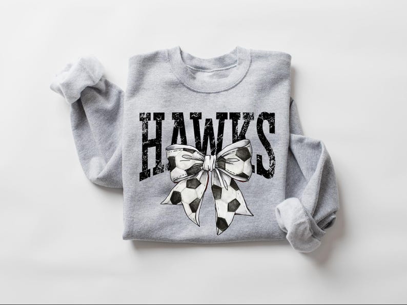A gray sweatshirt with the word "HAWKS" and a bow graphic printed on it.