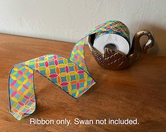 Brightly colored ribbon; 2.5” x 10 yards wired ribbon
