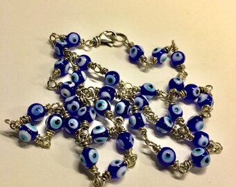 Boze oogbescherming talismanketting