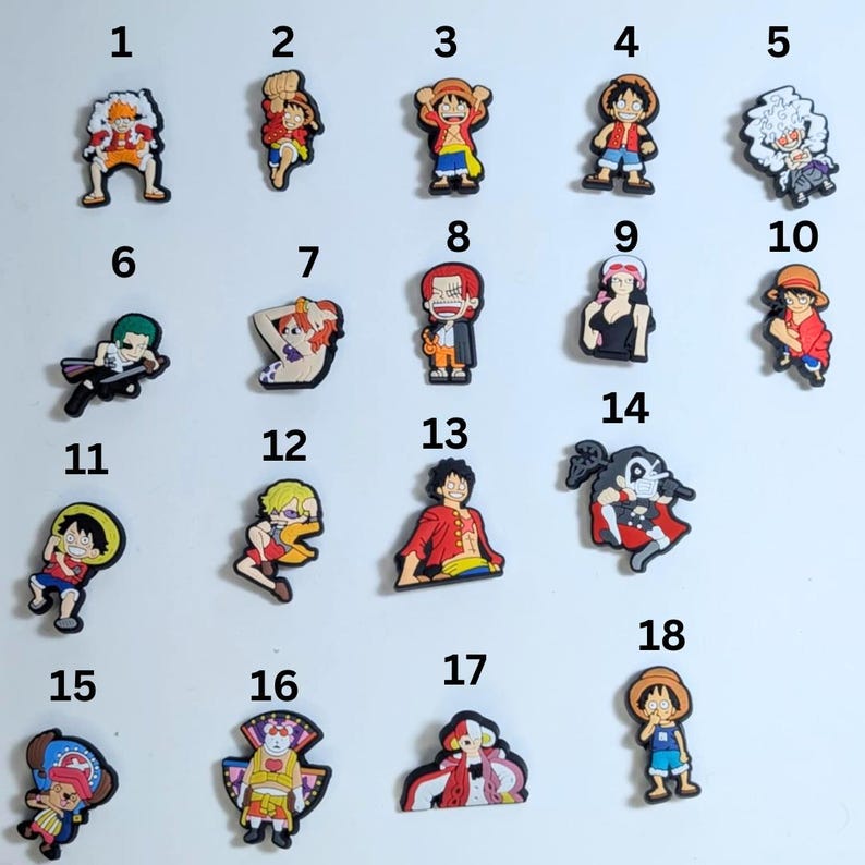 May include: Set of 18 colorful cartoon character shoe charms featuring characters from the popular anime series One Piece. The charms are made of rubber and feature various characters from the show, including Luffy, Zoro, Sanji, and more.