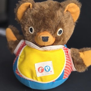 Fisher Price 1970s Vintage Musical Roly Poly Teddy Bear with chime.