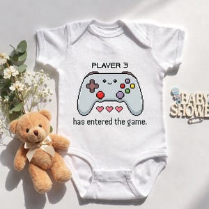 May include: A set of three ceramic mugs with a speckled, matte finish. The mugs are in shades of cream, light gray, and dark gray. Each mug has a simple, minimalist design, perfect for coffee or tea.